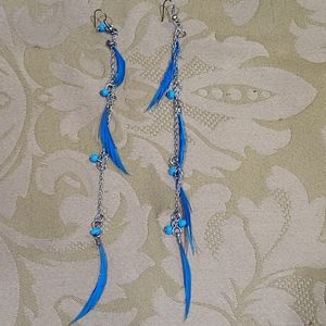 Long skinny blue feather and bead hook earrings